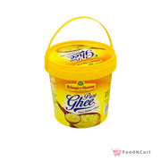 Yellow container of Pure Ghee with a visible brand logo on a white background